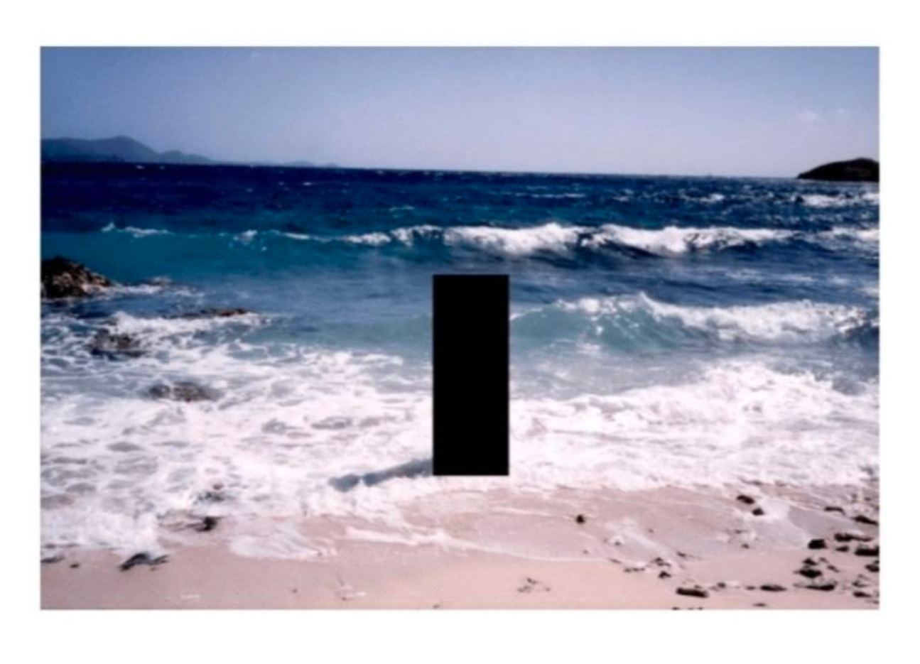 A censored image featuring a large black rectangle obscuring the center.